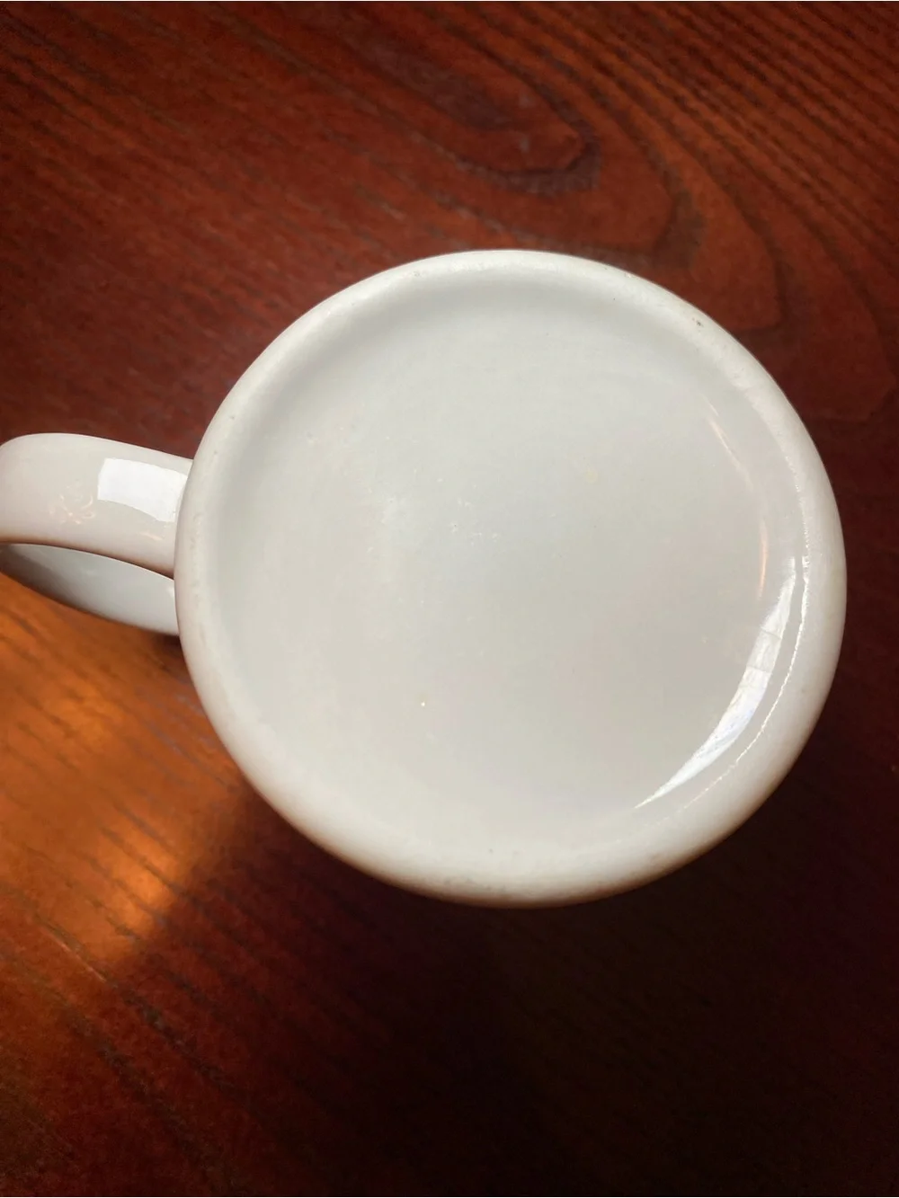 White Ceramic Coffee Mug with Blue KVIL Radio Logo. 10 Oz